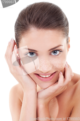 Image of happy woman holding her face in hand