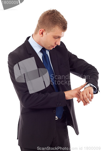 Image of  business man checking time