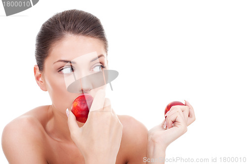 Image of woman eating peaches