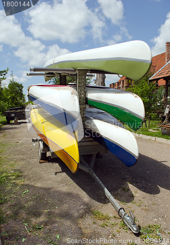 Image of Kayaks canoes loaded on special transport trailer 