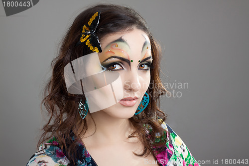 Image of Portrait of cute girl with idnian make up