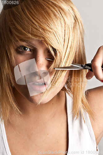 Image of woman with scissors