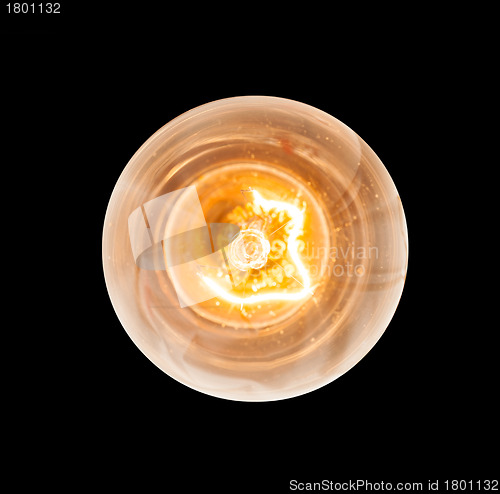 Image of Incandescent light bulb lit from above