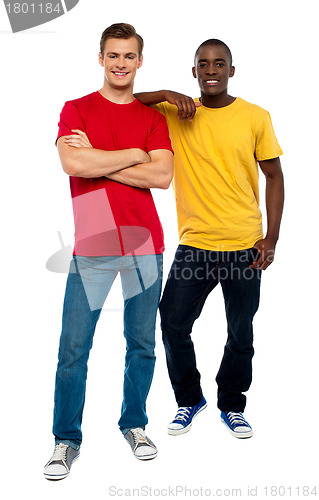 Image of Full length portrait of casual young dudes