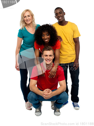 Image of Group of four happy young people