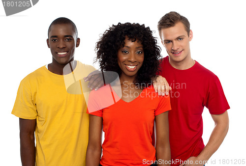 Image of College friends posing in casuals. Cheerful group