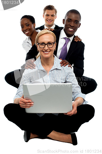 Image of Group of young attractive businesswomen and men