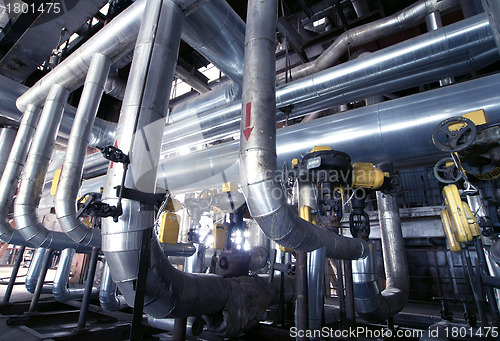 Image of Equipment, cables and piping as found inside of  industrial powe