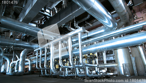 Image of Equipment, cables and piping as found inside of  industrial powe