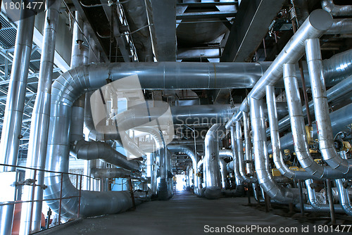Image of Equipment, cables and piping as found inside of  industrial powe