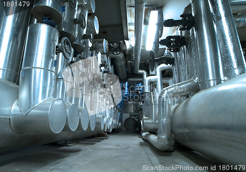 Image of Equipment, cables and piping as found inside of  industrial powe