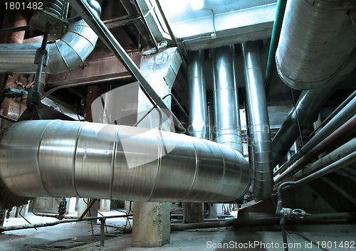 Image of Equipment, cables and piping as found inside of  industrial powe