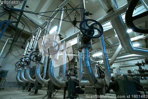 Image of Equipment, cables and piping as found inside of  industrial powe