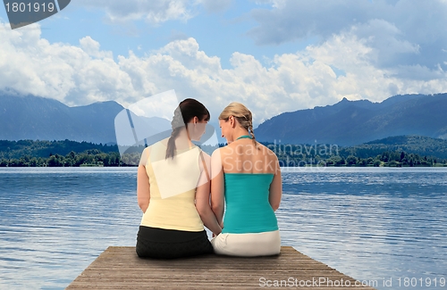 Image of Two Women on a lake
