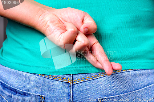 Image of Crossed fingers