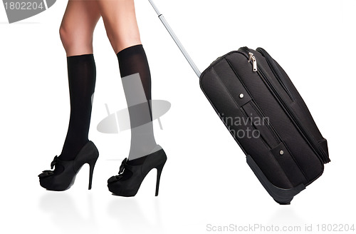 Image of Businesswoman and suitcase