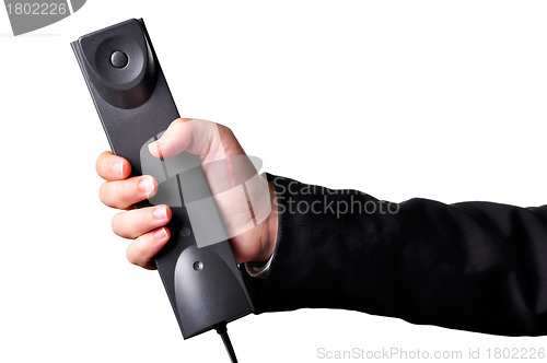 Image of Hand holding phone