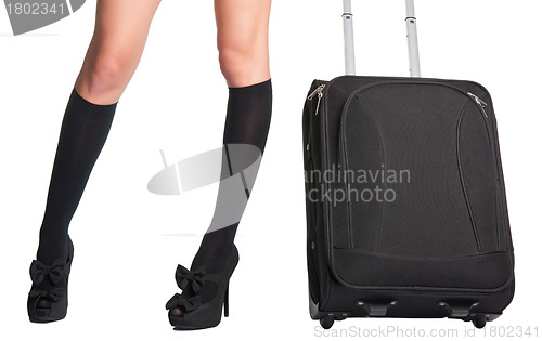 Image of Businesswoman and suitcase