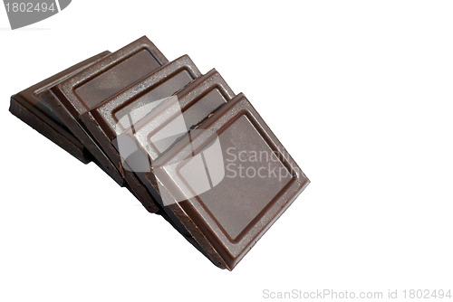 Image of Pieces of Dark Chocolate isolated over white