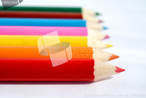 Image of Color pencil crayons on white background