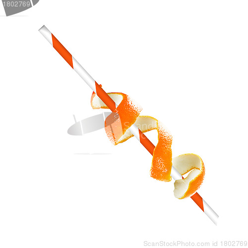 Image of orange with straw.