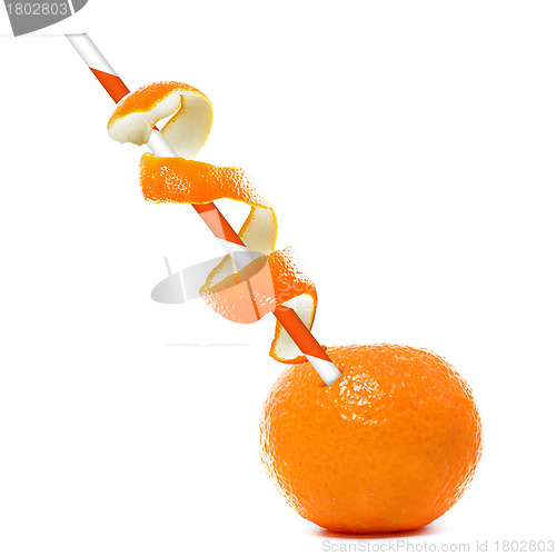 Image of orange with straw.