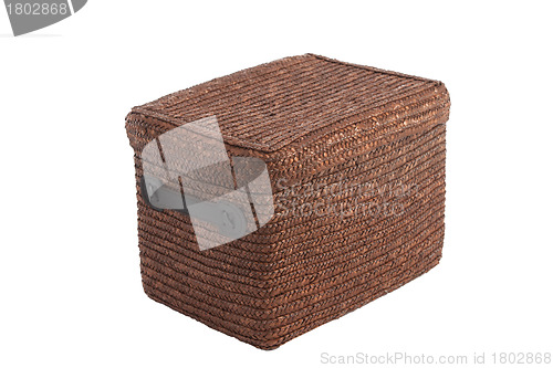 Image of decorative brown wicker basket with lid