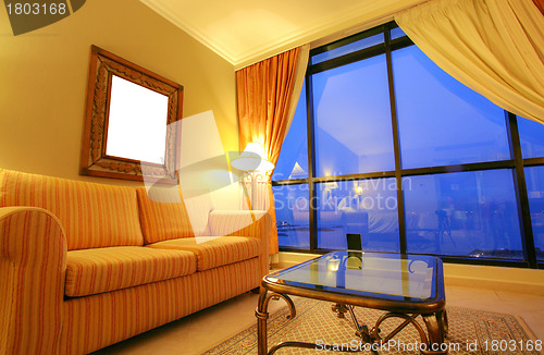 Image of Beautiful Living Room in New Luxury Home in the sunset