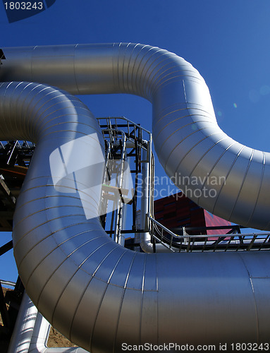 Image of Equipment, cables and piping as found inside of  industrial powe