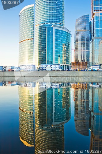 Image of Business skyscrapers and reflections in the river
