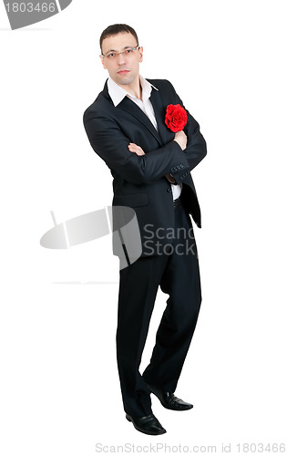 Image of A man with a tango dancer in red fabric flower in his jacket poc