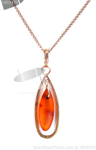 Image of gold pendant with amber