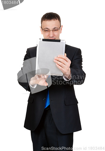 Image of Young businessman with a Tablet PC