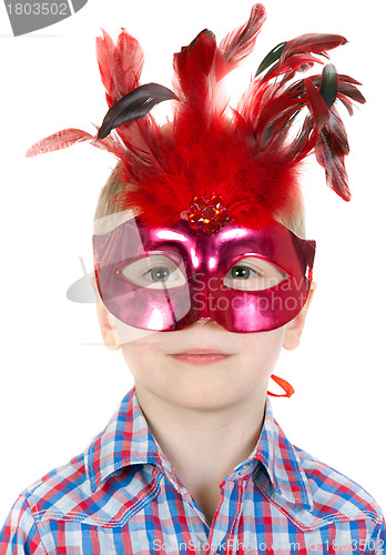 Image of The Boy in the masquerade mask with feathers