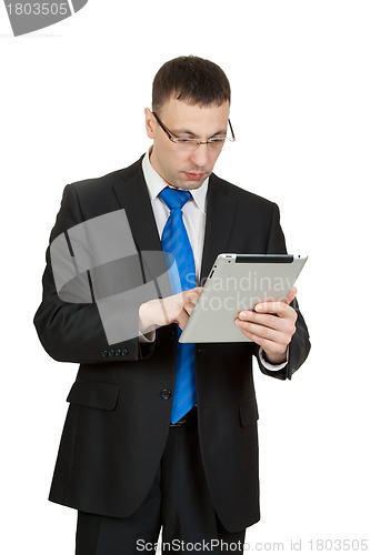 Image of Young businessman with a Tablet PC