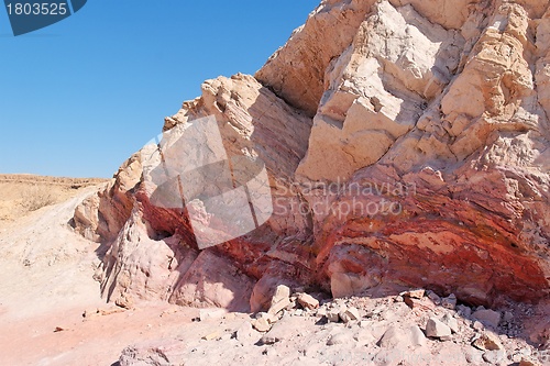 Image of Striped pink rock in stone desert 