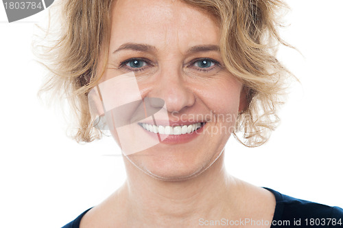 Image of Closeup of smiling aged woman