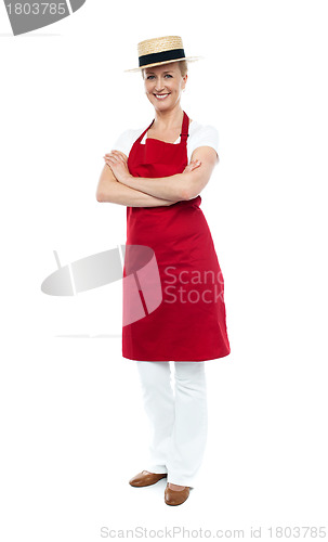Image of Beautiful confident chef posing in style, arms folded