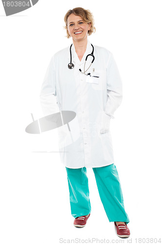 Image of Attractive senior doctor posing casually