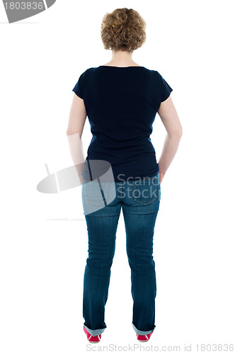 Image of Rear view of woman posing in style
