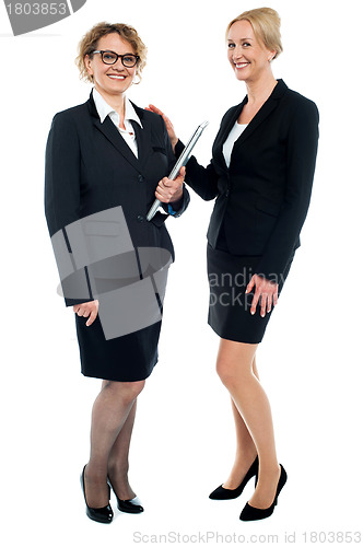 Image of Full length shot of corporate female friends