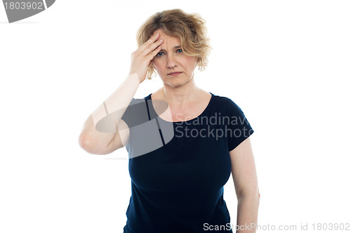 Image of Aged woman having headache