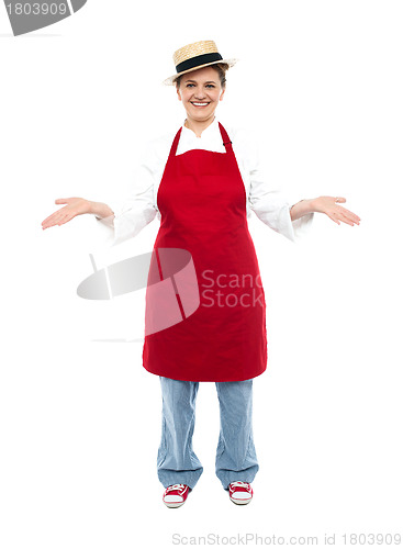 Image of Cook posing with open palms welcoming you