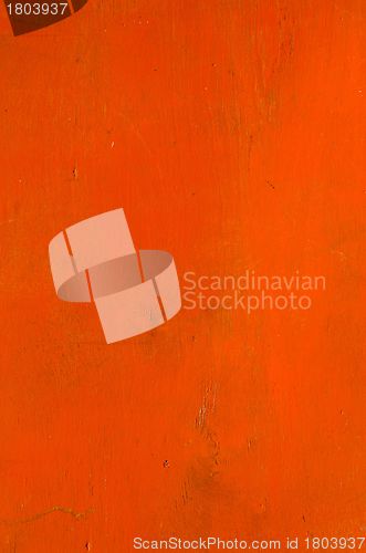 Image of Wooden plank orange color paint background. 