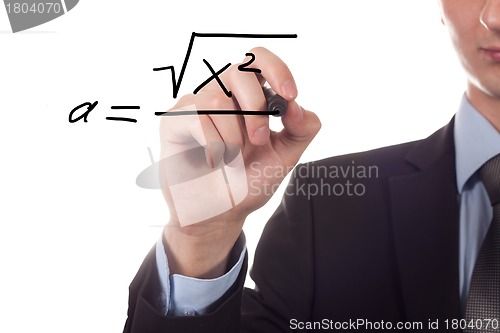 Image of Teacher writing a mathematical equation