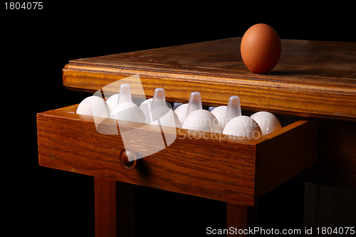 Image of eggs on old table