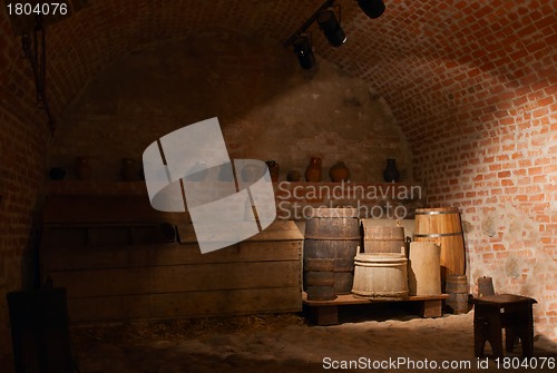 Image of wooden barrels at an basement