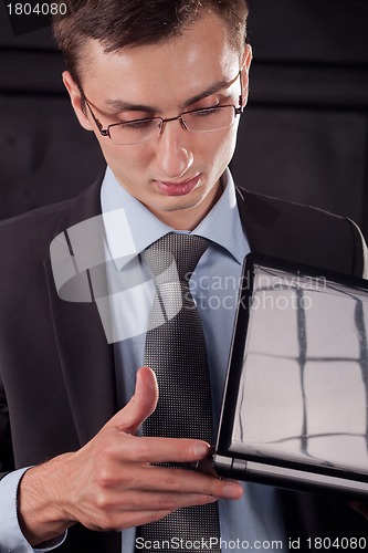 Image of Businessman with laptop