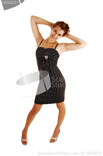 Image of Pretty girl in striped dress.