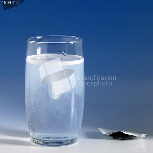 Image of fizzy tablet in a glass of water